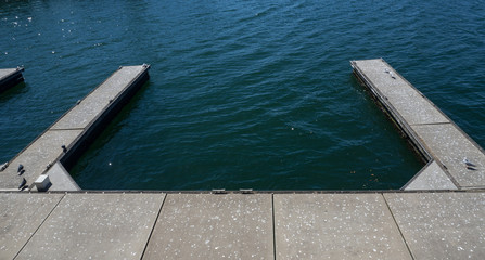 Empty boat dock with waterfront view.