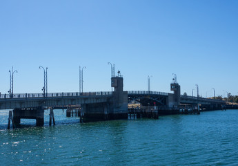 Fototapeta na wymiar Birkenhead Bridge across port Adelaide river in blue sky day.
