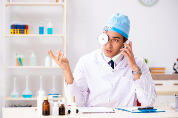 Young male doctor otolaryngologist working at the hospital 