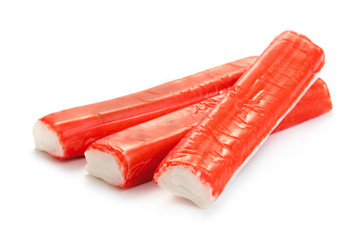 heap of crab sticks isolated on white background © Pineapple studio