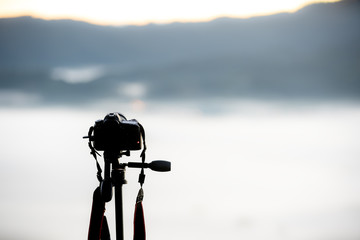 Camera  on Tripod standing alone.