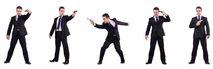 Man in suit with gun isolated on white 