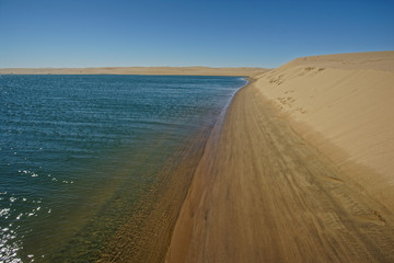 Atlantic Ocean meets Skeleton Coast desert, Namibia, Africa.