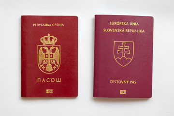 Slovak and Serbian passport isolated on white paper background