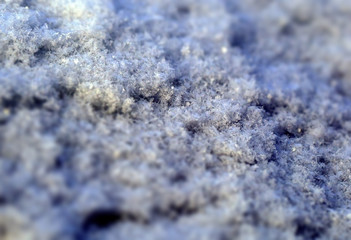 Blurred Natural background. Snow and ice texture closeup.