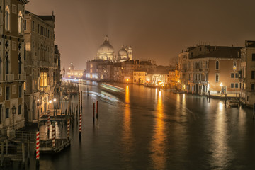 Night view on Grand Canal and basilica Santa Maria della Salute in Venice, Italy
