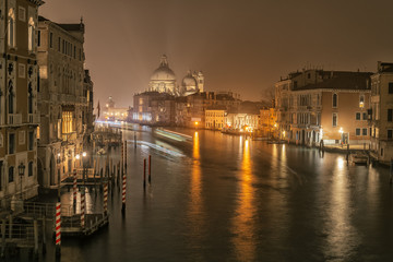 Fototapeta premium Night view on Grand Canal and basilica Santa Maria della Salute in Venice, Italy