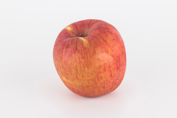 a tasty-looking apple with a white background