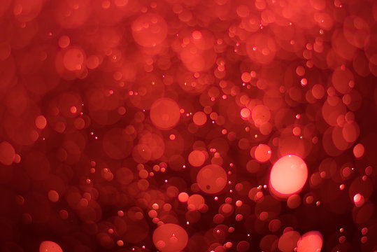 abstractr Ruby red background with blur bokeh light effect