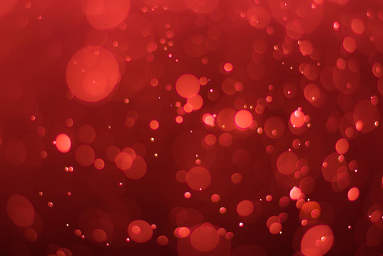 abstractr Ruby red background with blur bokeh light effect