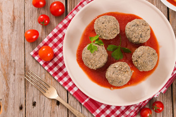 Meatballs with tomato sauce.