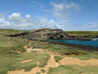 Large Outcrop with Clouds