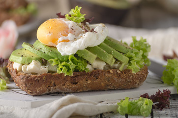 Homemade avocado poached egg sandwich