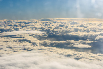 View on white clouds from the airplane window