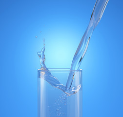 Pouring water into a glass with splash. Side view.
