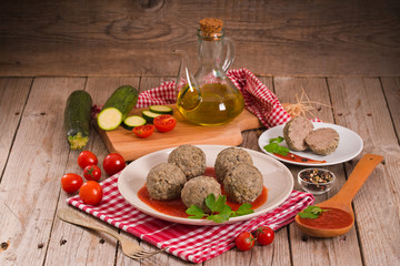 Meatballs with tomato sauce.