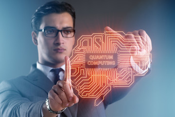 Businessman pressing virtual button in quantum computing concept