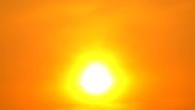 4K Sunset sky orange sky orange  outdoor summer nature sunrise with silver lining and cloud on the orange sky