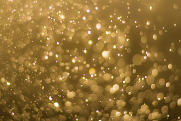 abstractr Gold background with blur bokeh light effect