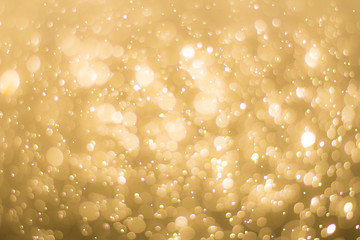 abstractr Gold background with blur bokeh light effect