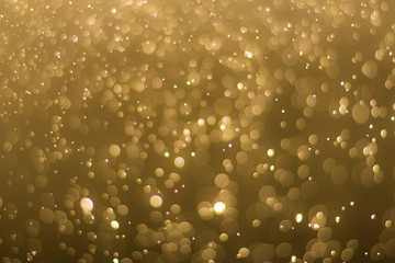 abstractr Gold background with blur bokeh light effect