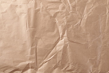 Wrinkly cardboard paper background and texture