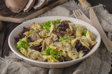 Homemade tortellini with mushrooms and walnuts