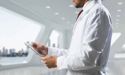 Fototapeta premium Medical industry concept by means of successful doctor
