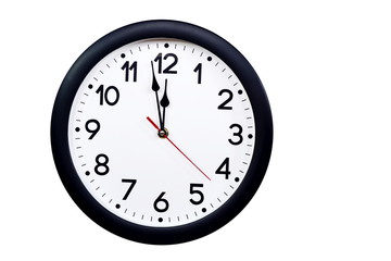 Time concept with black clock at a quarter to noon
