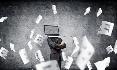 Businessman with laptop instead of head.