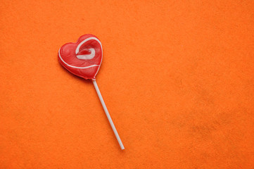 A heart shape lollipop