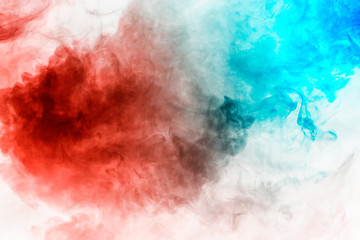 Background of blue and red wavy smoke on a white isolated ground. Abstract pattern of steam from vape.