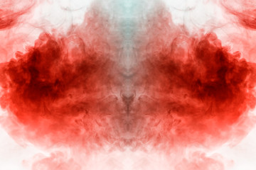 Background of blue and red wavy smoke on a white isolated ground in the shape oh the mystical ghost's head. Abstract pattern of steam from vape.