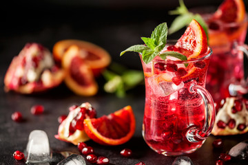 Red cocktail with blood orange and pomegranate.