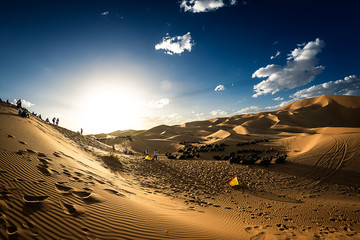 Sunset over the sand dunes in the Sahara desert, Morocco, Africa.