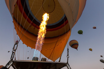 Flame in balloons. Flying with balloons over Cappadocia valleys, Turkey