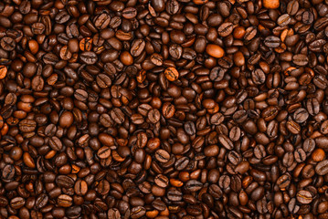 Coffee beans background. Top view. Coffee beans texture.
