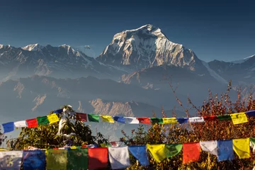 Crédence en verre imprimé Dhaulagiri Bhuddism flags with Dhaulagiri peak in background at sunset in Himalaya Mountain, Nepal.