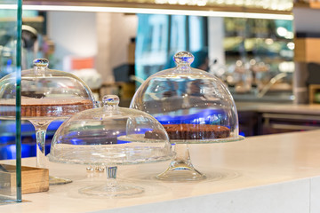 Cake glass bell jar in cafe bar
