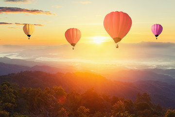Sunset Mountain View has a floating balloon in the sky.