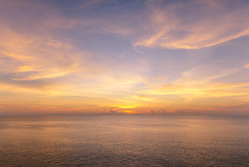 Fototapeta na wymiar Sunrise or sun set at the Sea and cloudy sky