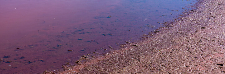 contaminated water and soil with iron oxides in the industrial zone.  Banner for design.