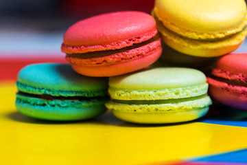 Close-up of delicious fresh macaroon with different fillings on the table, macro photo