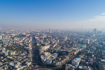 Fototapeta na wymiar Aerial view circular intersceation transport road with city building