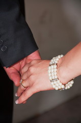 Bride and groom's hands -symbol of love