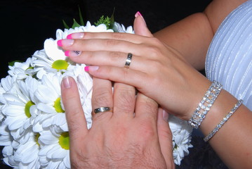 Fototapeta premium Newlywed hands with rings