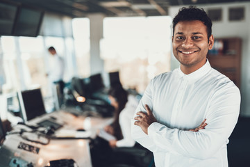 Smiling dispatch man staying in navigation room