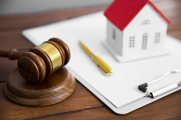 house model with judge  on document