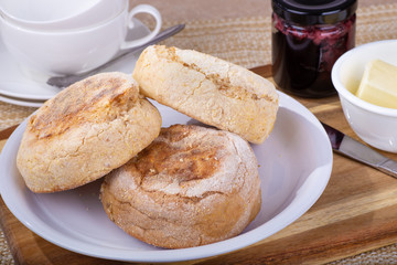 Plate of English Muffins on a Wooden Board