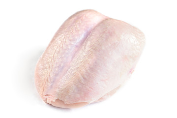 Raw chicken breast isolated on white background.